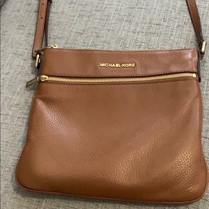 Michael Kors light brown cross body.